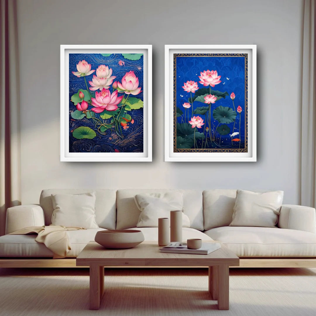 Two framed paintings of pink lotus flowers on a wall above a white sofa with a wooden coffee table.