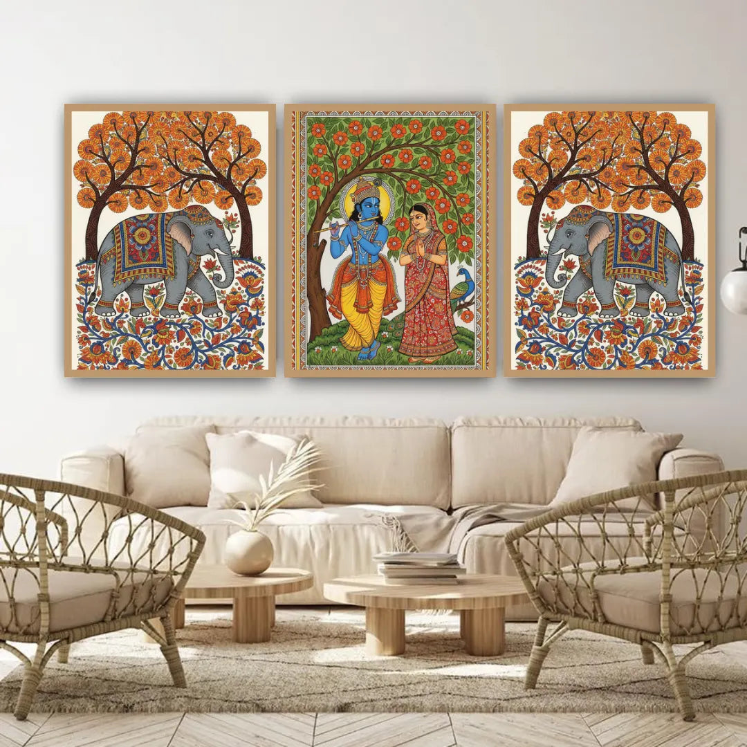 Decorative wall art featuring elephants and traditional figures in a living room setting.