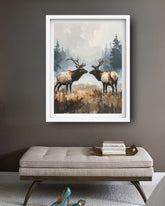 Framed artwork of two elk on a wall above a sofa