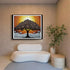 Framed abstract artwork of a tree with a sunset on the wall above a modern white sofa.