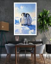 Framed artwork of two penguins on a snowy landscape above a dining table.