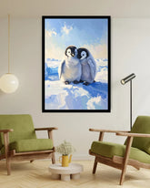 Framed artwork of two penguins on a snowy landscape in a living room setting.
