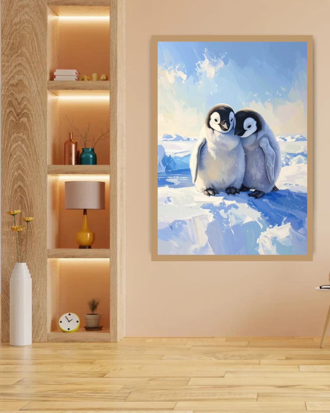 Framed artwork of two penguins on a snowy landscape in a room with wooden floor and shelves.