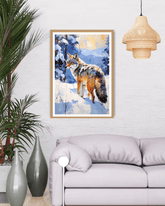 Framed artwork of a wolf in a snowy landscape above a gray sofa in a living room.