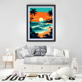 A framed tropical beach sunset art print hangs on a white wall above a modern white daybed with gray patterned pillows in a styled children&