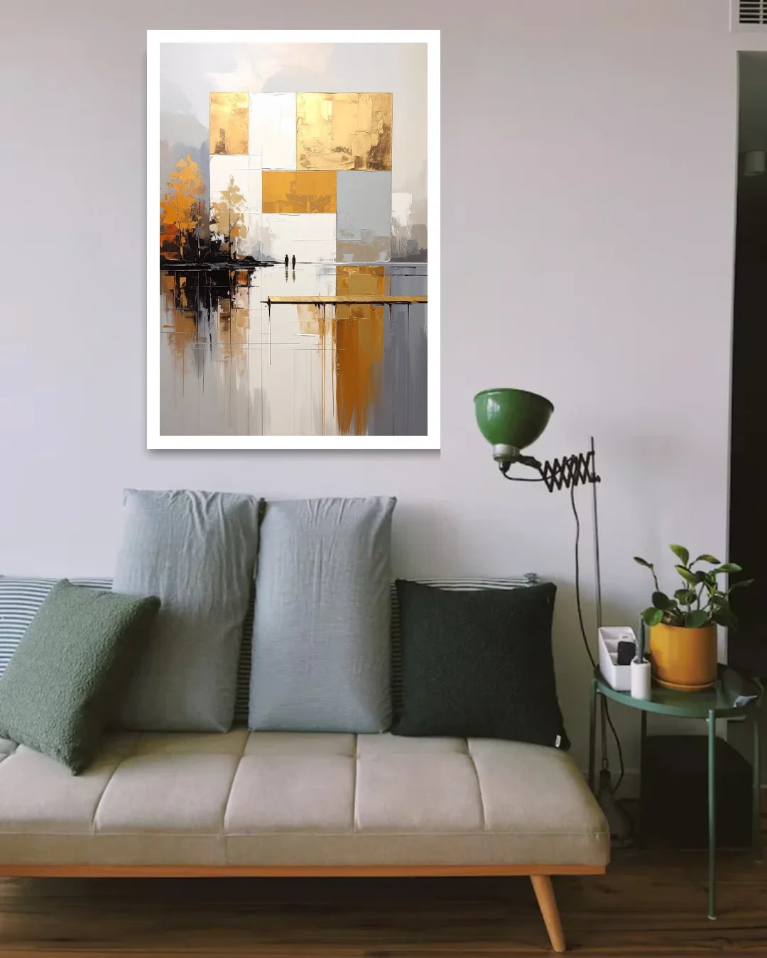 Living room with a beige sofa, decorative pillows, and a framed abstract painting on the wall.
