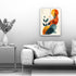 Modern abstract botanical wall art canvas displayed above a grey sofa in a minimalist living room
