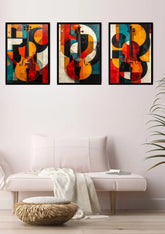 Colorful abstract musical triptych canvas wall art featuring guitar-inspired artwork displayed in a modern living room.
