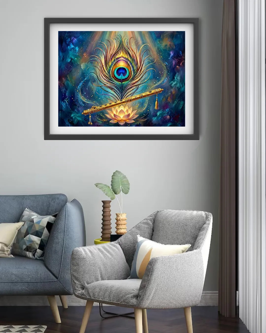 A framed abstract art print featuring a peacock feather and a golden flute on a dark blue cosmic background, displayed on a light gray wall above a modern gray armchair in a living room setting.