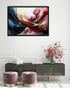 A framed abstract floral wall art print hangs above a dark gray console table in a styled room. The artwork features flowing brushstrokes of deep blue, burgundy red, gold, and pink on a white background.