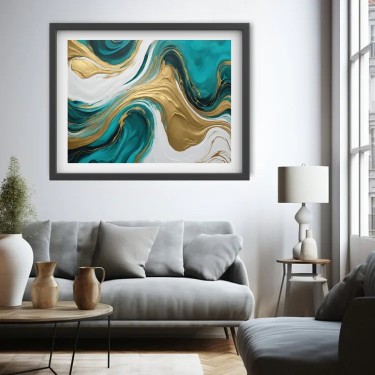 Framed abstract wall art with flowing teal, gold, and white marbled swirls, displayed above a gray sofa in a modern living room setting.