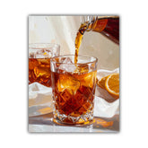 A square canvas wall art print depicting an artistic still life of amber liquor being poured from a bottle into a diamond-patterned ice glass, with another glass, an orange slice, and white cloth in the background.