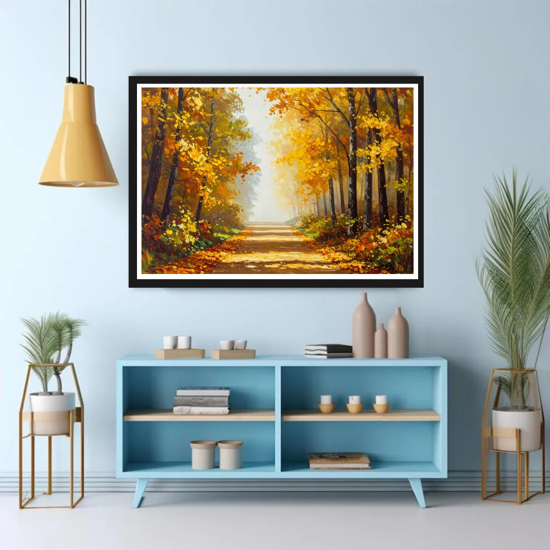 Framed painting of a forest scene above a blue cabinet with decorative items.