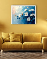 Blue floral wall art canvas hanging above a yellow sofa in a stylish living room
