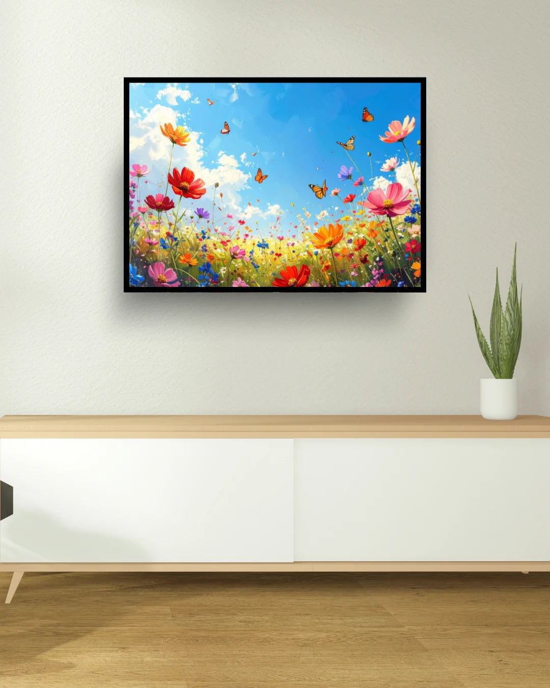 Colorful butterfly flower wall art canvas displayed above a white cabinet in a modern interior
