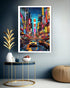 Framed artwork of a vibrant city street scene with neon lights on a wall above a table.