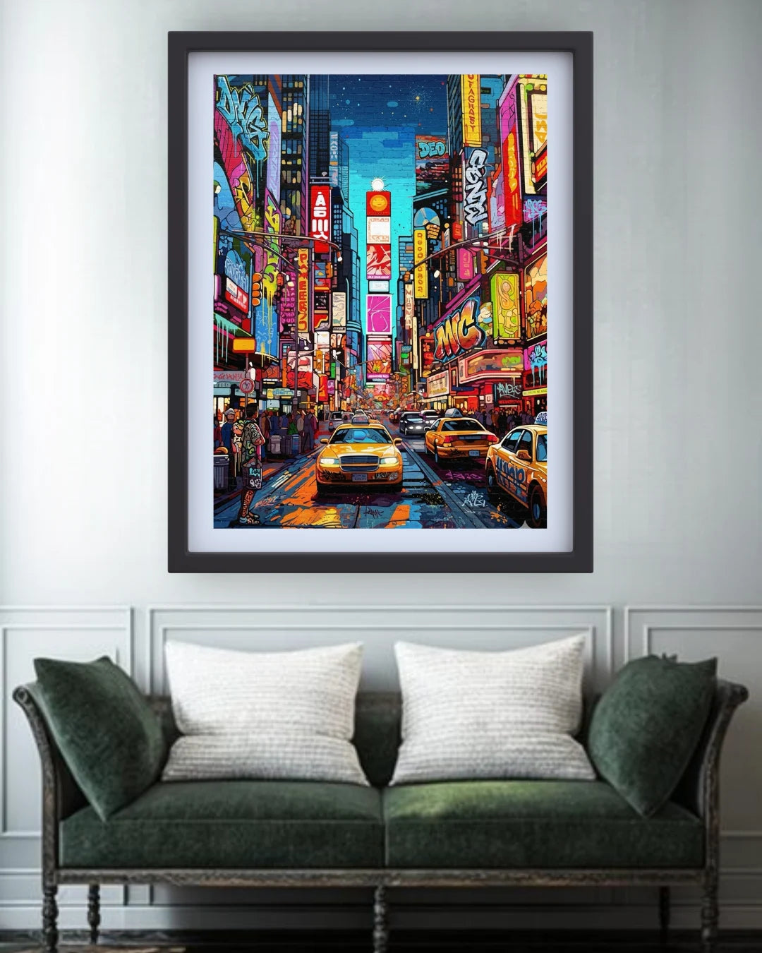 Framed artwork of a vibrant city street scene with neon lights above a green sofa.