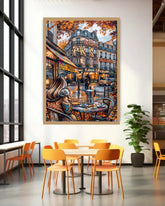 Framed artwork of a city street scene with people at a cafe table, displayed in a modern interior setting.