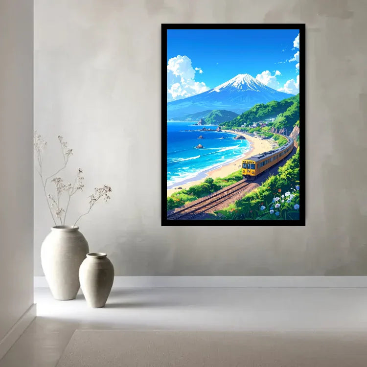 A framed vertical art print depicting a scenic Japanese coastal landscape with Mount Fuji, a yellow train, and blue ocean, displayed on a light gray wall above two neutral ceramic vases.