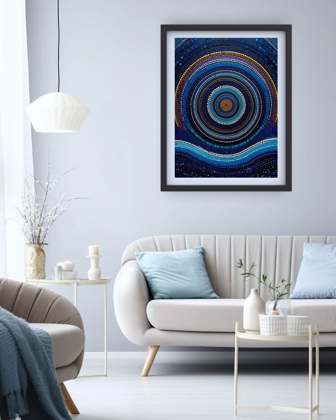 Framed abstract art piece on a wall above a sofa in a living room.