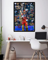 Framed artwork of a sports figure holding a bat on a wall above a desk.