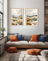 desert landscape wall art above sofa in cozy home interior