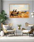 Desert landscape canvas wall art with camels in a modern living room featuring elegant chairs and minimalist décor.