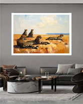 Framed desert landscape canvas painting displayed in a contemporary office with modern furniture.