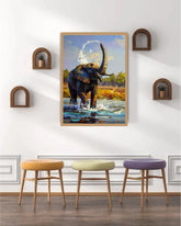 Framed artwork of an elephant in a natural setting on a wall above three colorful stools.