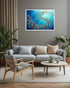 colorful fish swirl wall art displayed above sofa in modern living room