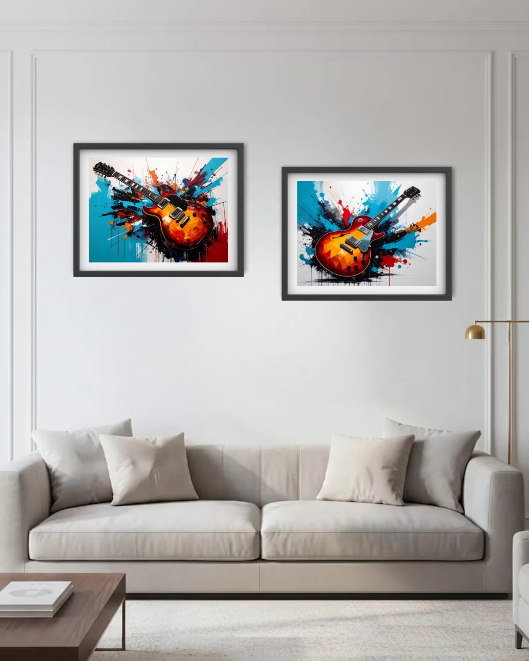 Two framed abstract guitar art prints hang on a white wall above a light beige sofa in a modern living room setting.