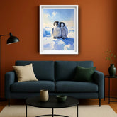  framed picture of penguins on an orange wall.