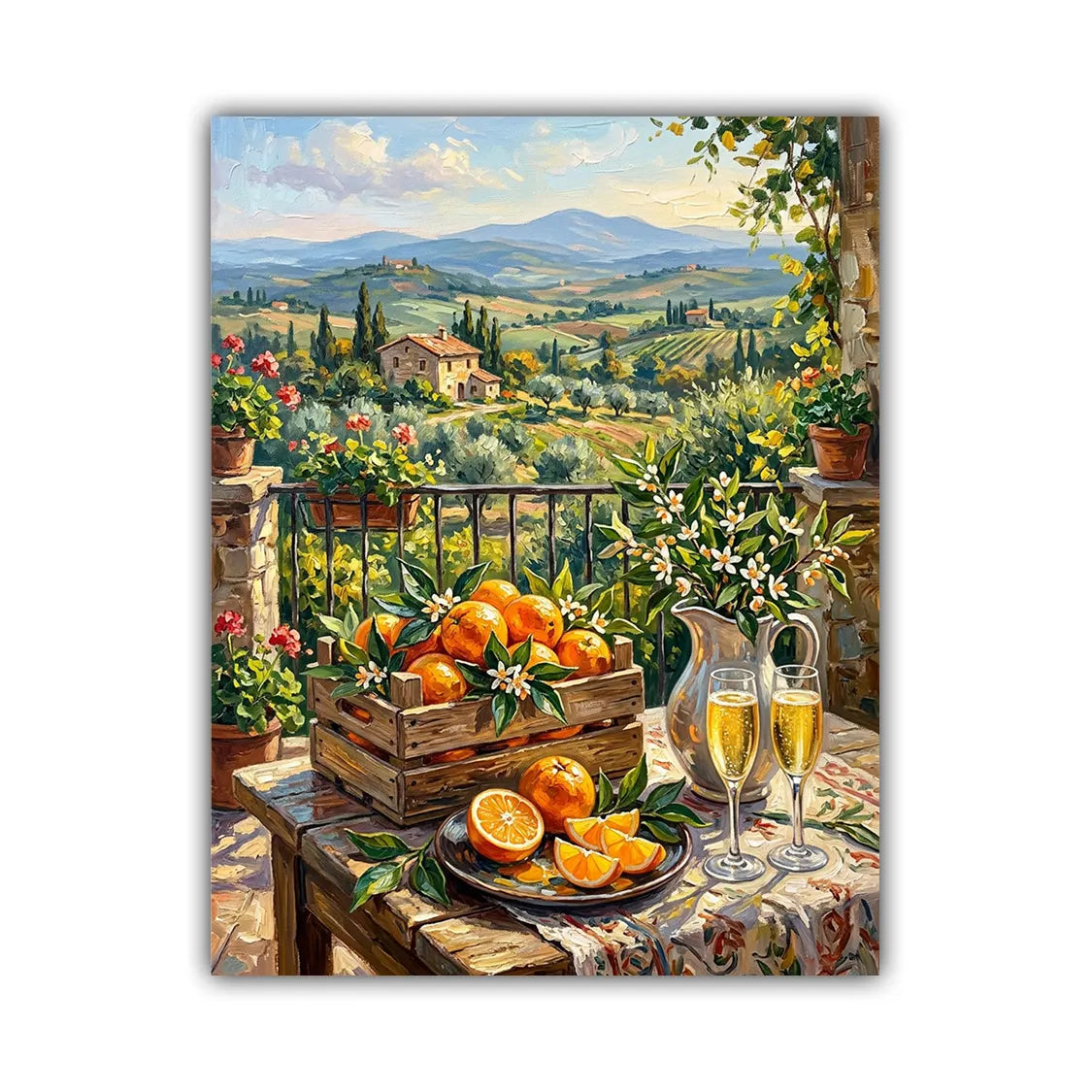 A vertical canvas art print depicting a sunny Tuscan landscape with rolling hills, cypress trees, and a stone villa, styled with a wooden crate of oranges, a pitcher, and two glasses of white wine on a table in the foreground.