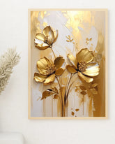 Gold floral wall art canvas with elegant metallic flowers on a light background
