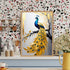 Elegant golden peacock canvas wall art displayed on a kitchen counter against a stylish terrazzo wall