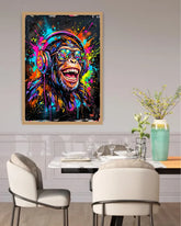 Colorful monkey art print on a wall above a dining table