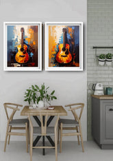 Two abstract paintings on a wall above a gray sofa in a living room.