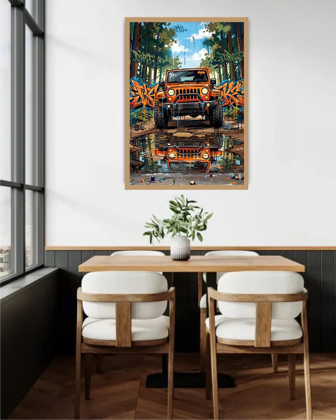 Dining room with a framed artwork of a Jeep on the wall above a table and chairs.