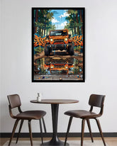 Framed artwork of an orange truck in a forest setting above a table with chairs.