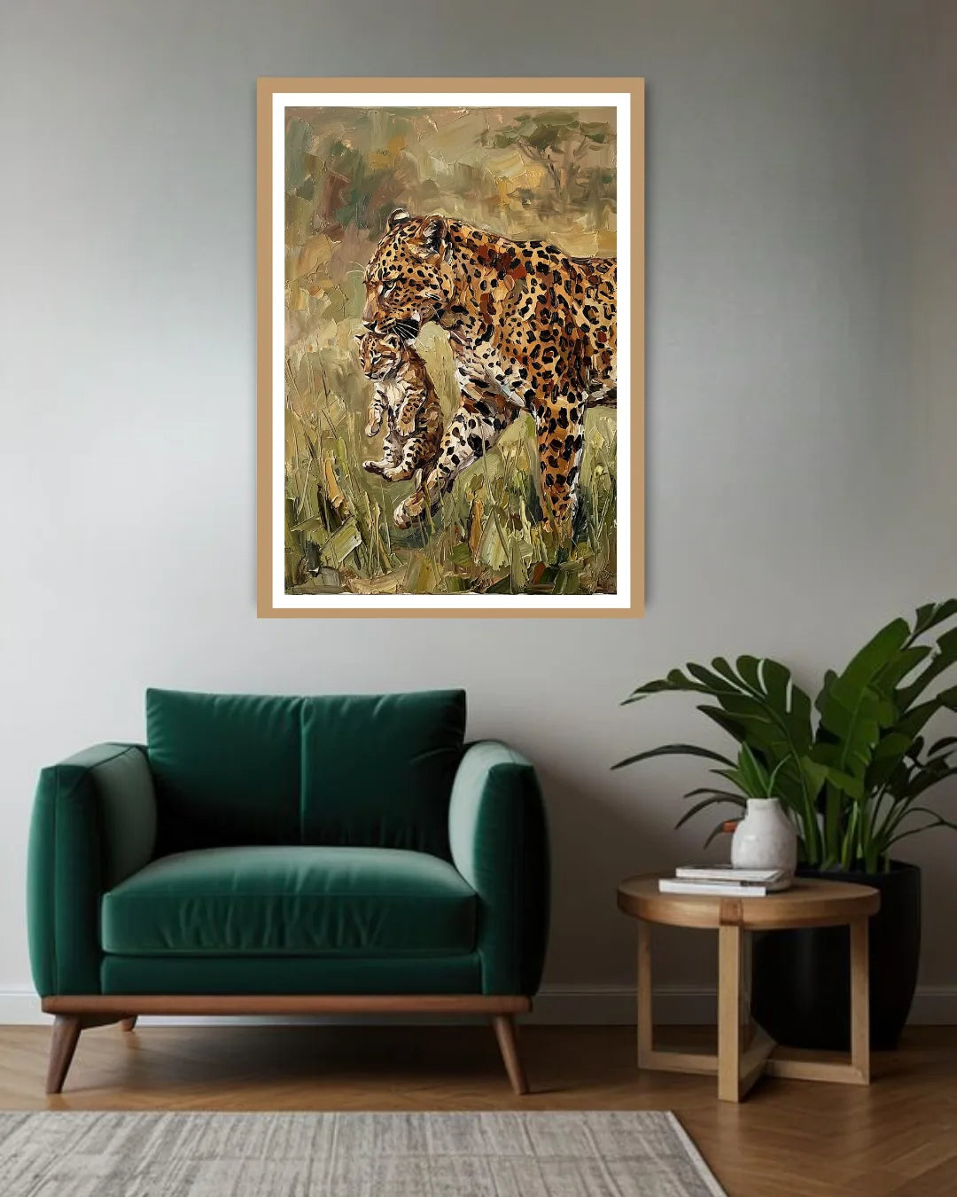 Framed artwork of leopards on a wall above a green armchair in a living room.