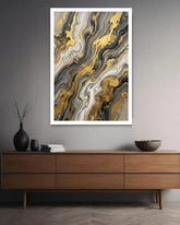 Abstract art print on a wall above a wooden console table.