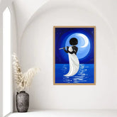 Contemporary moonlit flute player canvas wall art displayed on an arched feature wall in a modern home.