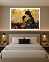 A framed wall art print depicting a mother and child in a golden, ornate scene, displayed above a neatly made bed in a modern bedroom setting.