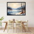 A framed landscape art print depicting a snowy mountain lake scene with a full moon, hung on a light beige wall above a wooden dining table and chairs.