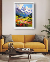A framed colorful landscape painting of a mountain valley with wildflowers hangs on a beige wall above a mustard yellow sofa in a modern living room setting.