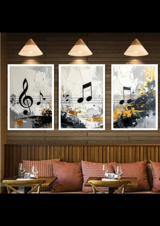 Three framed abstract musical note wall art prints hang above a wooden bench with pink cushions in a styled interior setting.