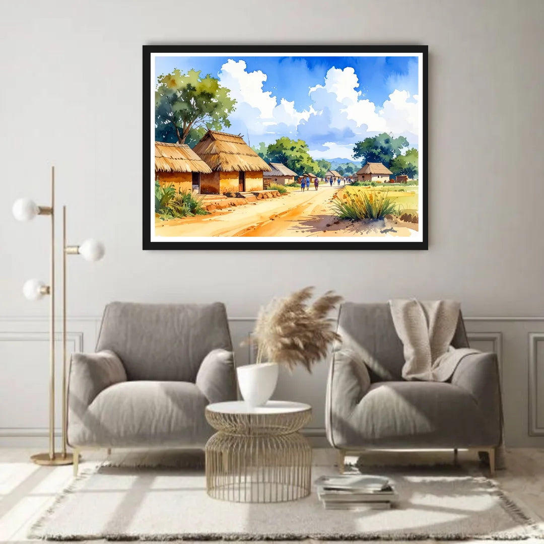 Framed landscape painting of a village scene above a living room with gray chairs and a coffee table.