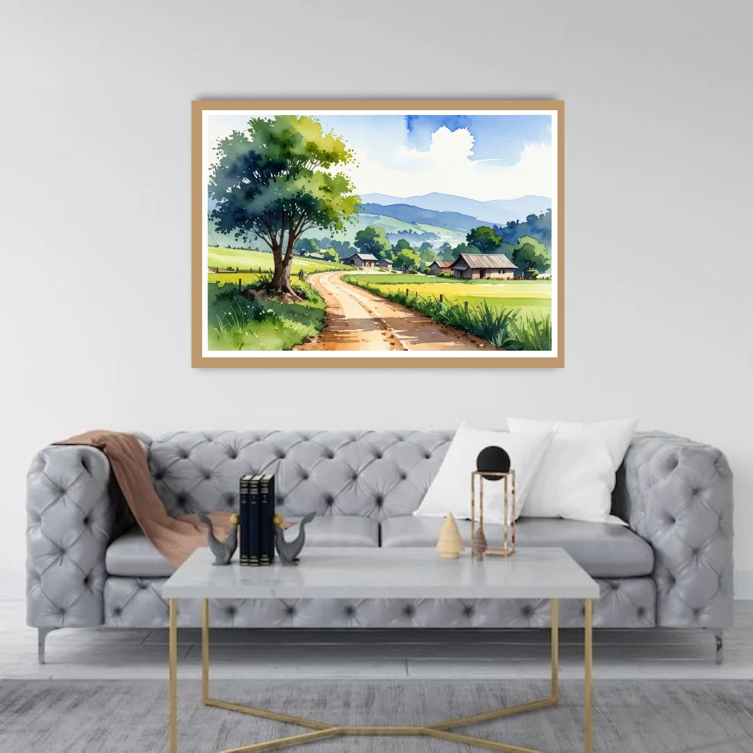 Framed landscape painting above a gray sofa in a living room.