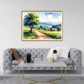 Framed landscape painting above a gray sofa in a living room.
