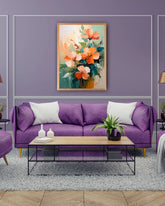Orange floral wall art canvas displayed above a purple sofa in a modern living room

